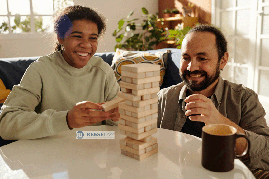 Dad and daughter after child custody modification using a family law attorney near Washington, DC